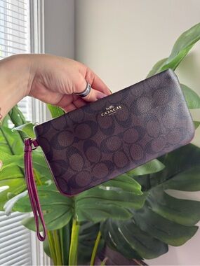 Coach Brown Signature Wristlet with Plum Trim